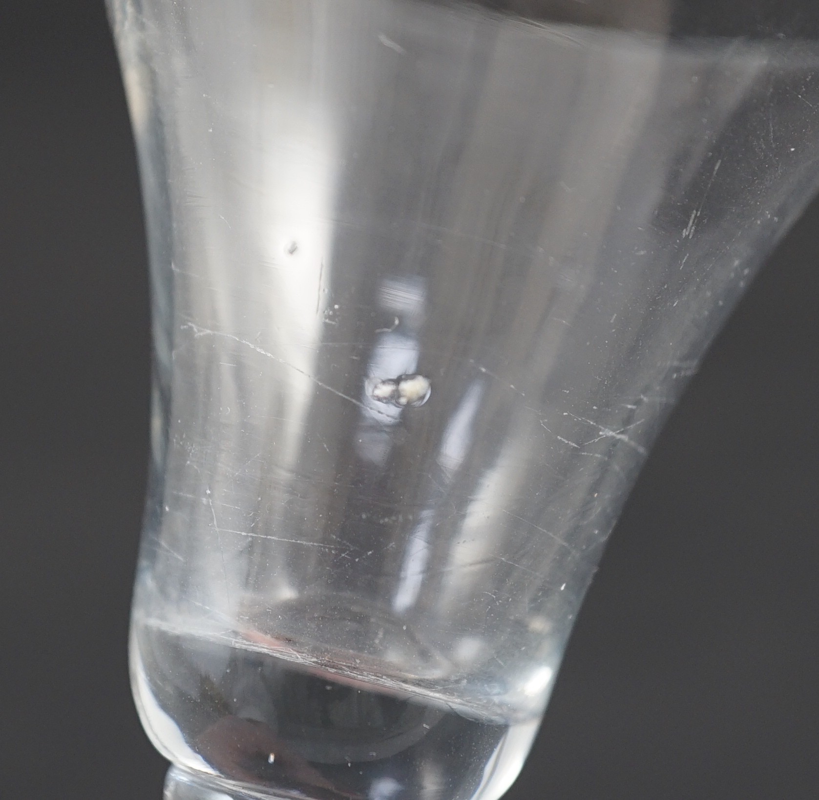 A Georgian baluster glass with teardrop air bubble stem, c.1730, 12.5cm high